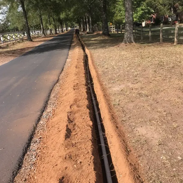 Irrigation mainline pipe run along a residential street